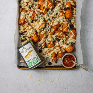 Roasted Harissa Baby Carrot and Cannellini Beans with a Vegan Yogurt Drizzle